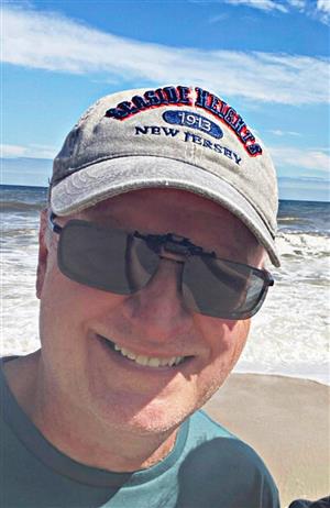 Dennis E. Spohn, 64